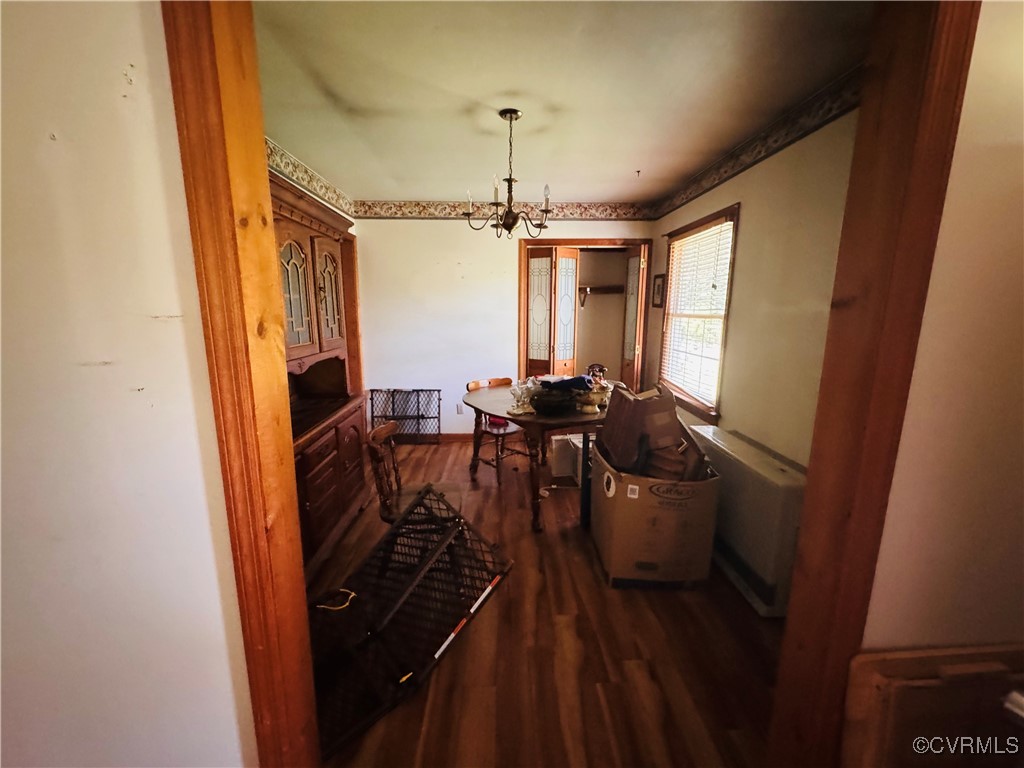 4814 Stage Junction Road Columbia, VA 23038 - Photo 4 of 30 a view of a dining room with furniture window and wooden floor