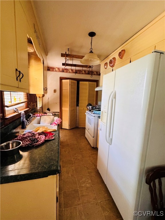 4814 Stage Junction Road Columbia, VA 23038 - Photo 6 of 30 a kitchen with refrigerator and window