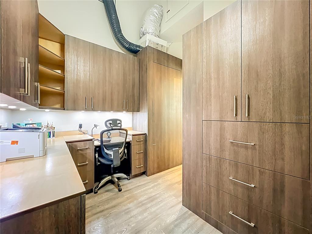 1825 Pams Way Geneva, FL 32732 - Photo 16 of 60 a view of a workspace with furniture and a window