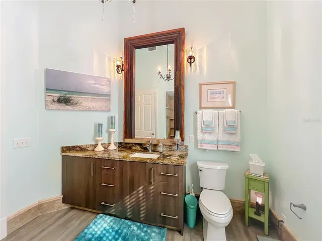 a view of a storage and utility room with washer and dryer