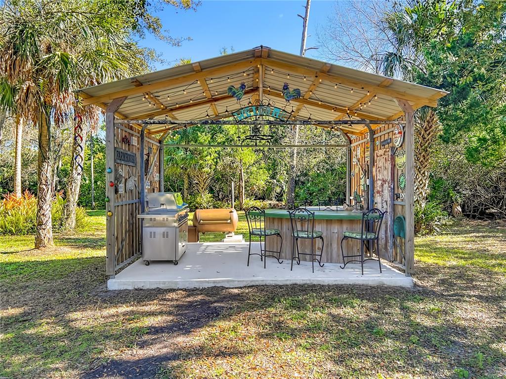 1825 Pams Way Geneva, FL 32732 - Photo 34 of 60 a view of a swimming pool with a patio