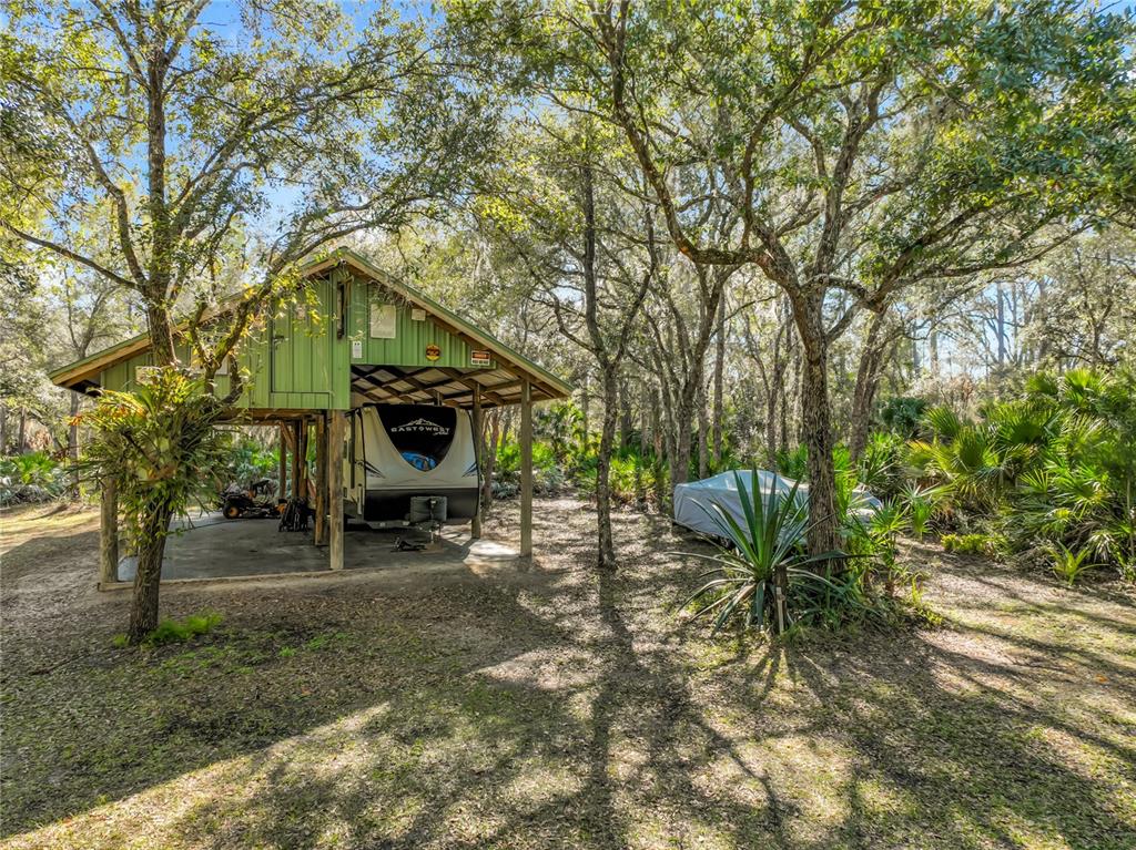1825 Pams Way Geneva, FL 32732 - Photo 42 of 60 a view of a chairs in a backyard