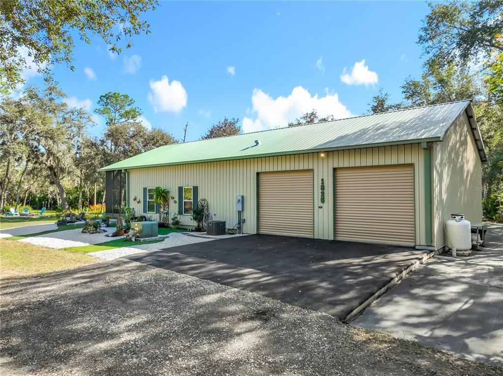 1825 Pams Way Geneva, FL 32732 - Photo 44 of 60 a view of a house with a yard and garage