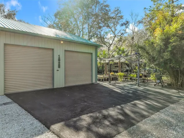 a view of a back yard of a house