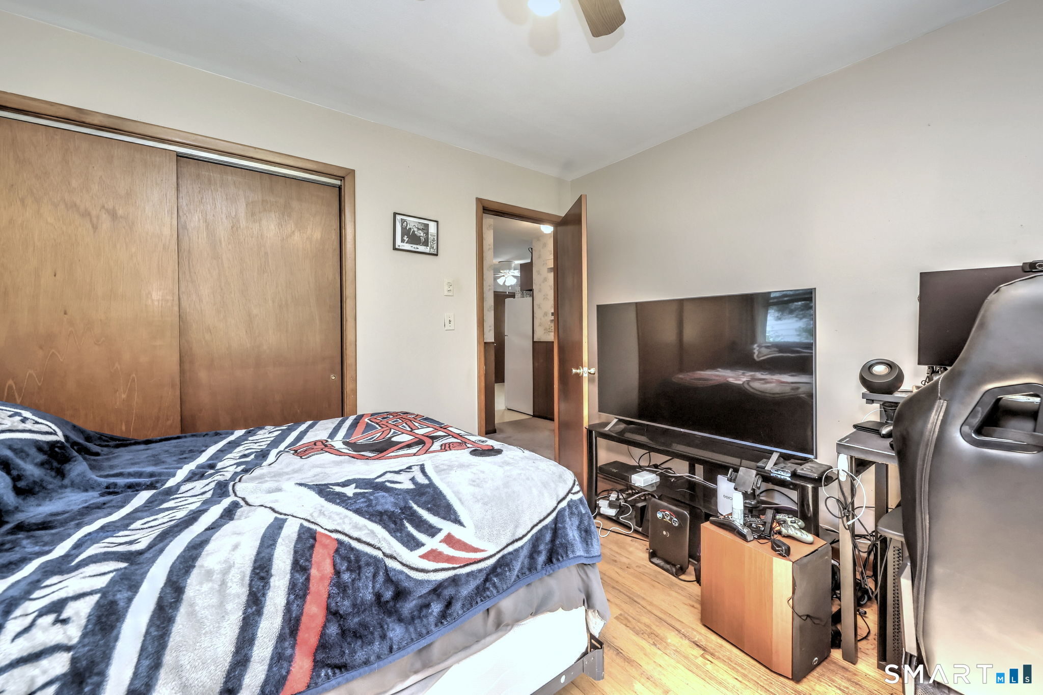212 Swain Avenue Meriden, CT 06450 - Photo 31 of 38 a bedroom with a bed and a flat screen tv