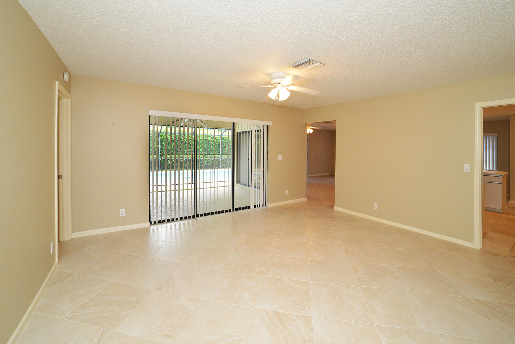17290 Lake Park Road Boca Raton, FL 33487 - Photo 16 of 28 a view of an empty room with a window