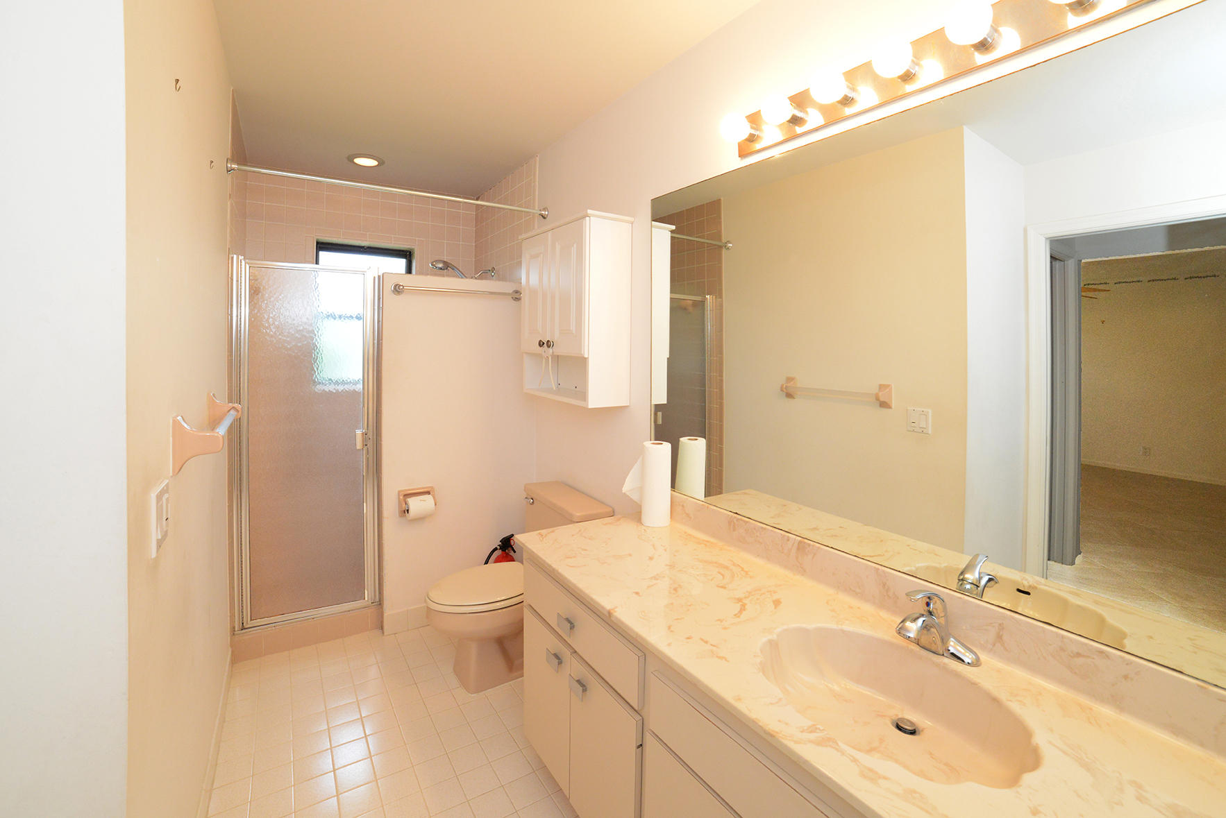 17290 Lake Park Road Boca Raton, FL 33487 - Photo 21 of 28 a bathroom with a sink a toilet and shower