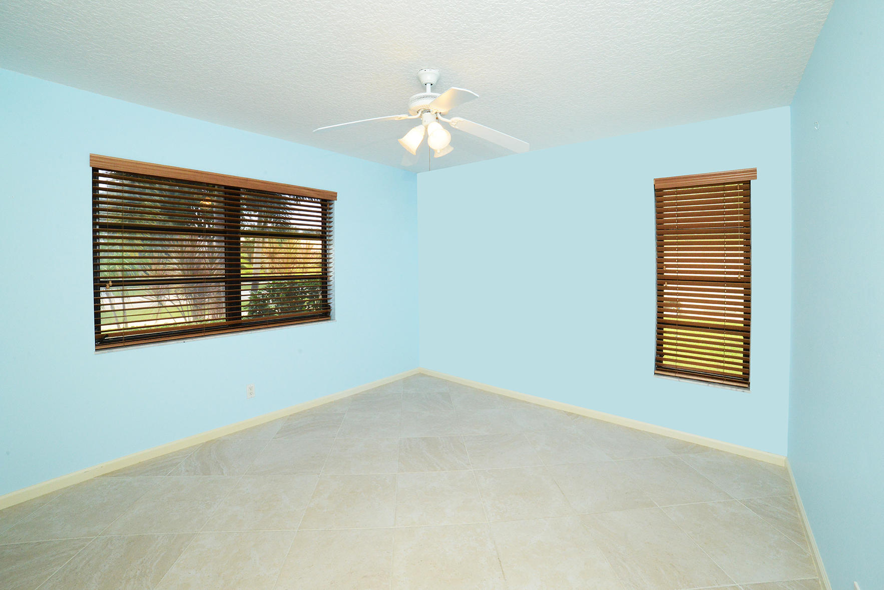 17290 Lake Park Road Boca Raton, FL 33487 - Photo 22 of 28 a view of an empty room with a window