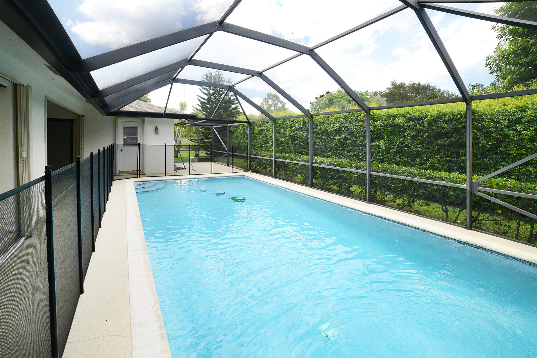 17290 Lake Park Road Boca Raton, FL 33487 - Photo 26 of 28 a view of outdoor space with swimming pool