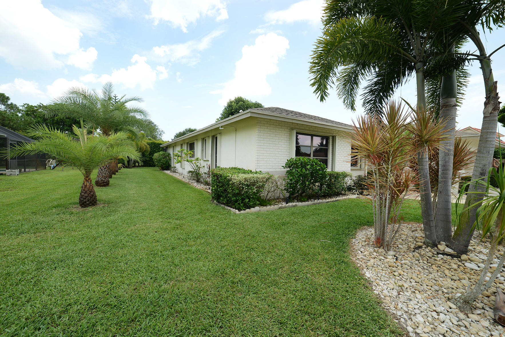 17290 Lake Park Road Boca Raton, FL 33487 - Photo 5 of 28 a view of a house with a yard