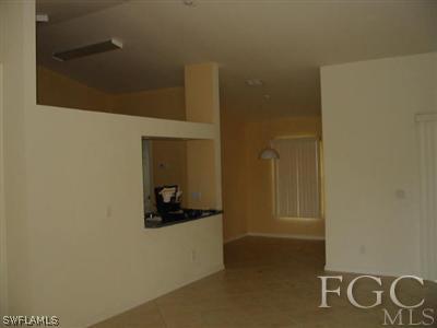 4005 1st Street Southwest Lehigh Acres, FL 33976 - Photo 2 of 5 a bathroom with a sink and mirror