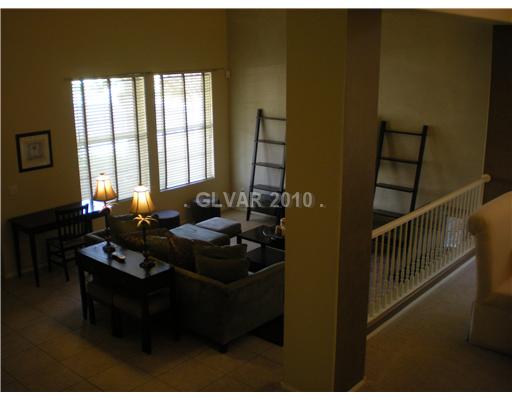 418 Rhythm Street Henderson, NV 89074 - Photo 8 of 22 Property Photo. Living room view from stairs.
