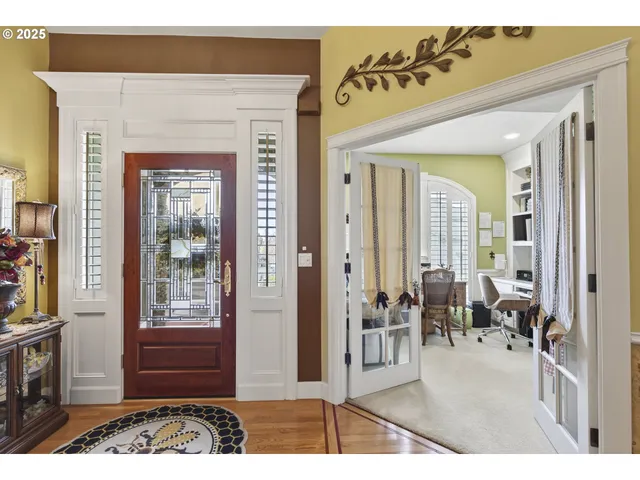 a workspace with furniture and a book shelf