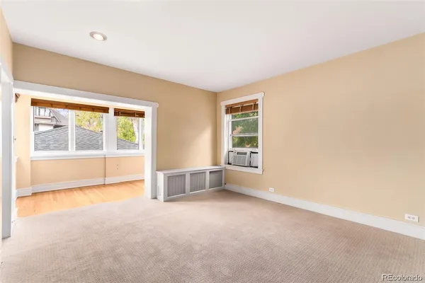 an empty room with windows