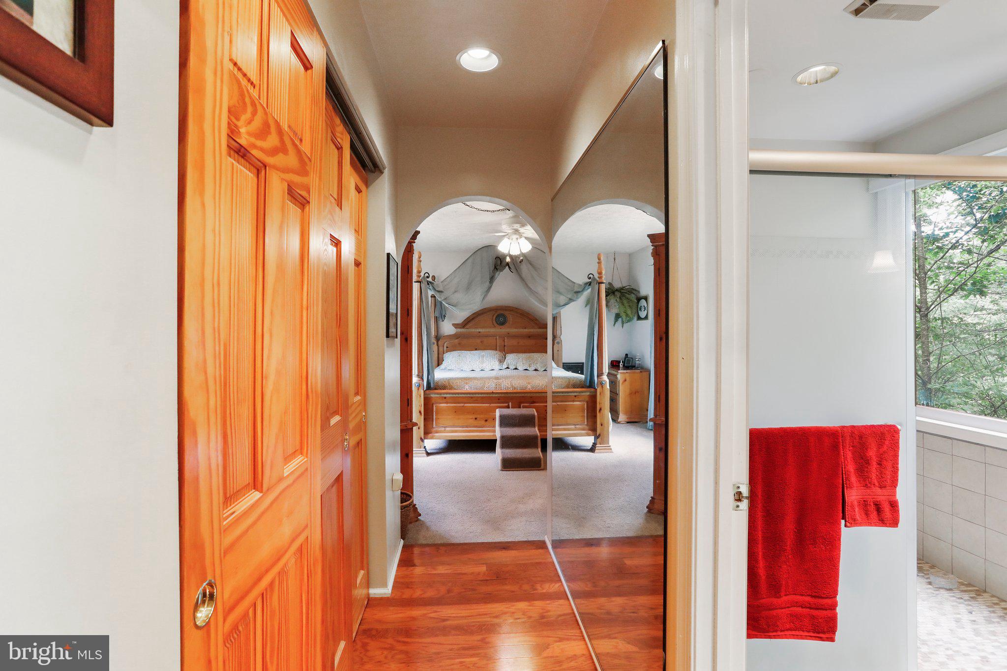 2599 Tabor Road Berkeley Springs, WV 25411 - Photo 18 of 50 Hall to the first floor bathroom and main bedroom
