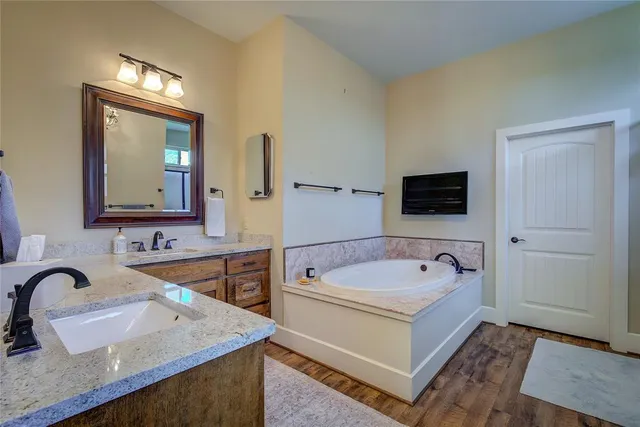 a bathroom with a sink and a bathtub