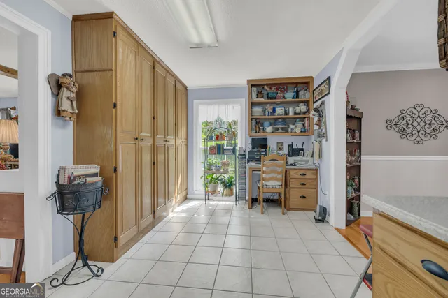 a room with furniture and wooden floor