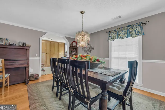 a view of a livingroom with furniture and front door