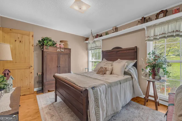 a view of swimming pool with an outdoor space and seating area