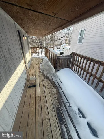 a balcony with hardwood