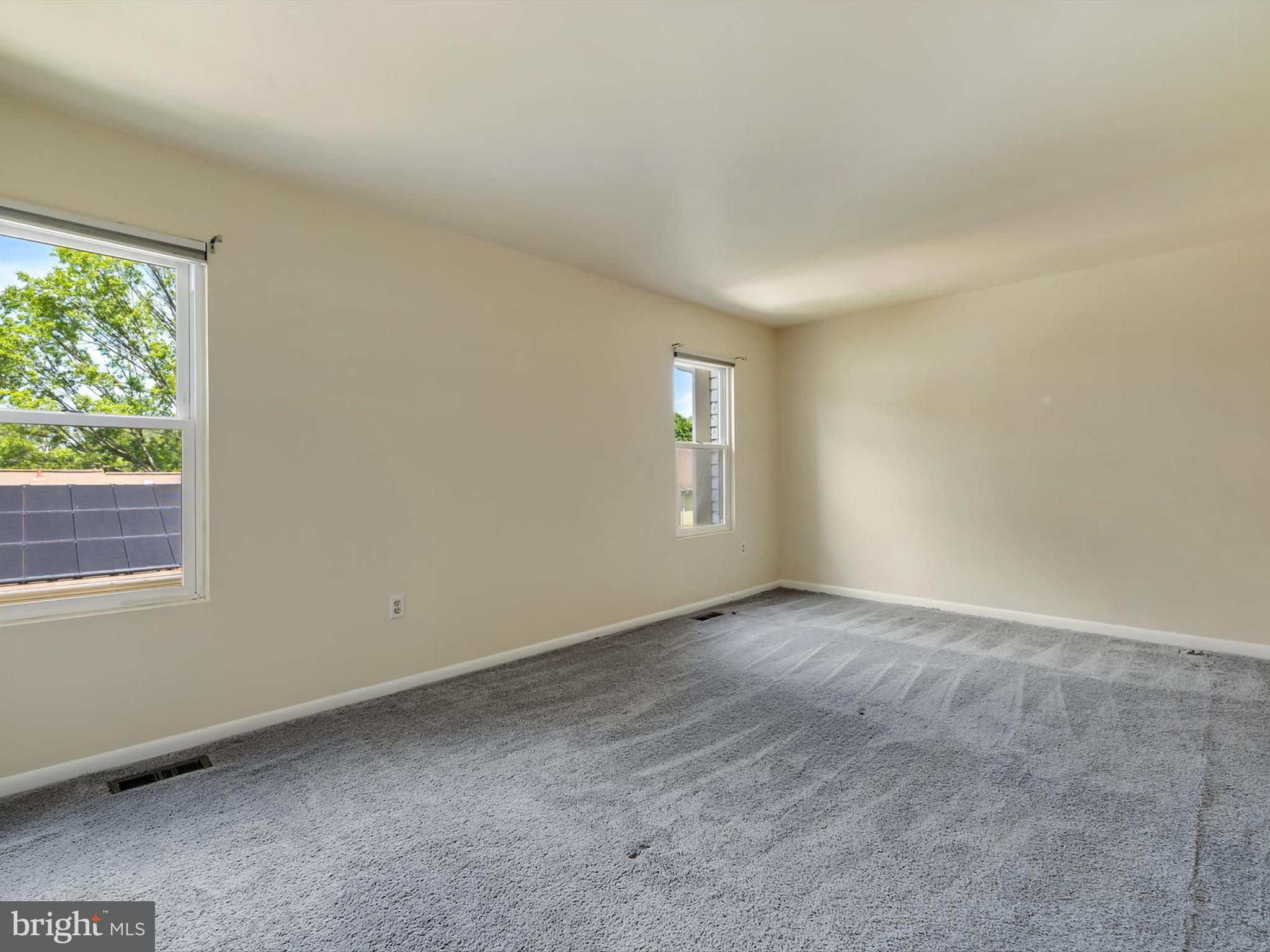 2846 Schoolhouse Circle Silver Spring, MD 20902 - Photo 16 of 32 an empty room with windows