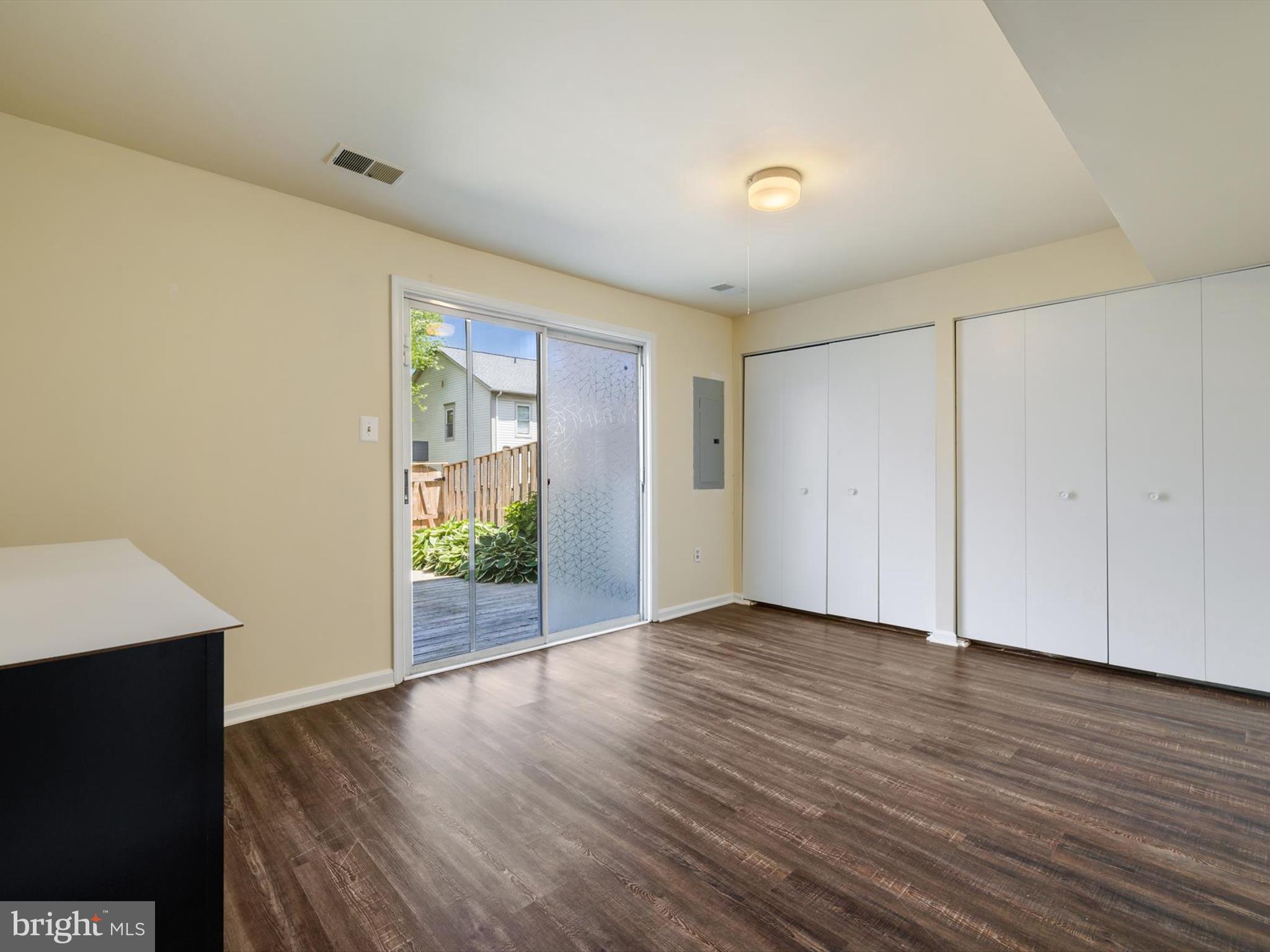 2846 Schoolhouse Circle Silver Spring, MD 20902 - Photo 24 of 32 an empty room with wooden floor