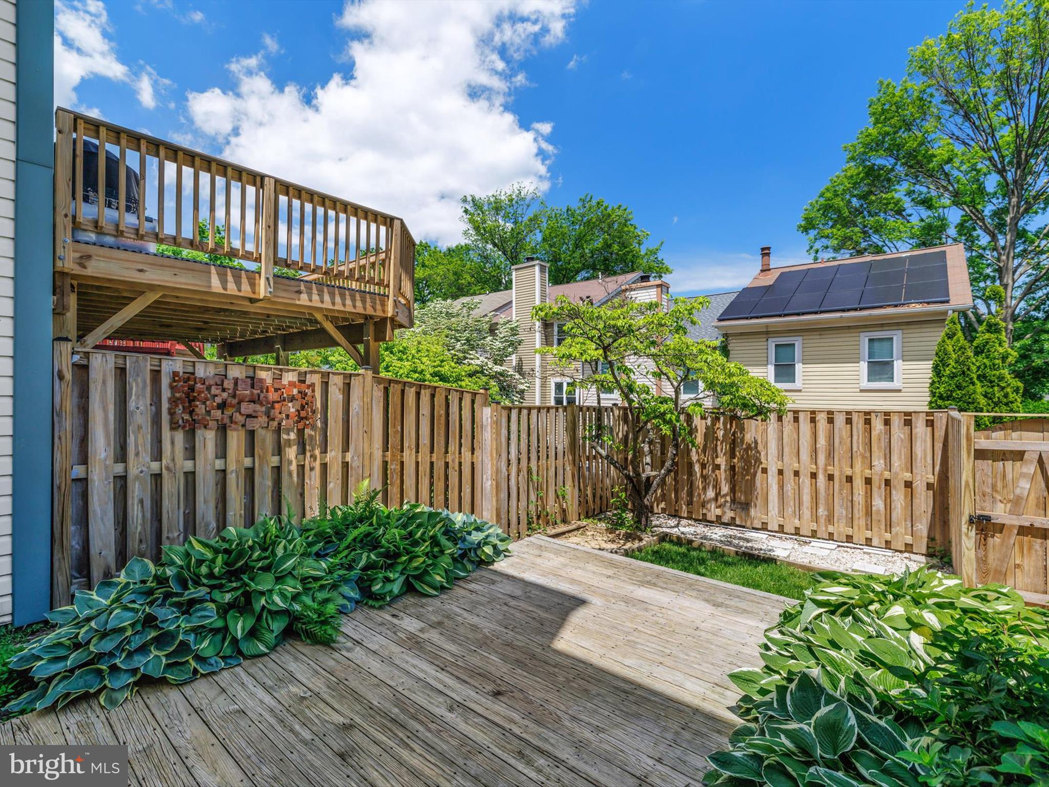 2846 Schoolhouse Circle Silver Spring, MD 20902 - Photo 29 of 32 a view of a house with wooden fence