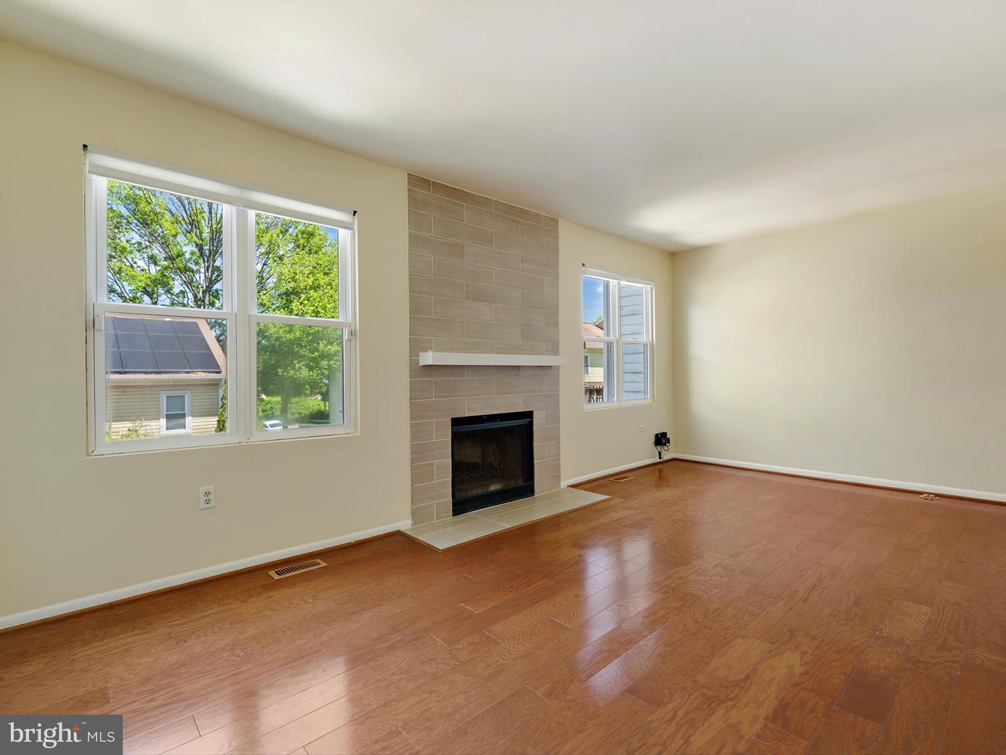 2846 Schoolhouse Circle Silver Spring, MD 20902 - Photo 8 of 32 a view of empty room with window and fireplace