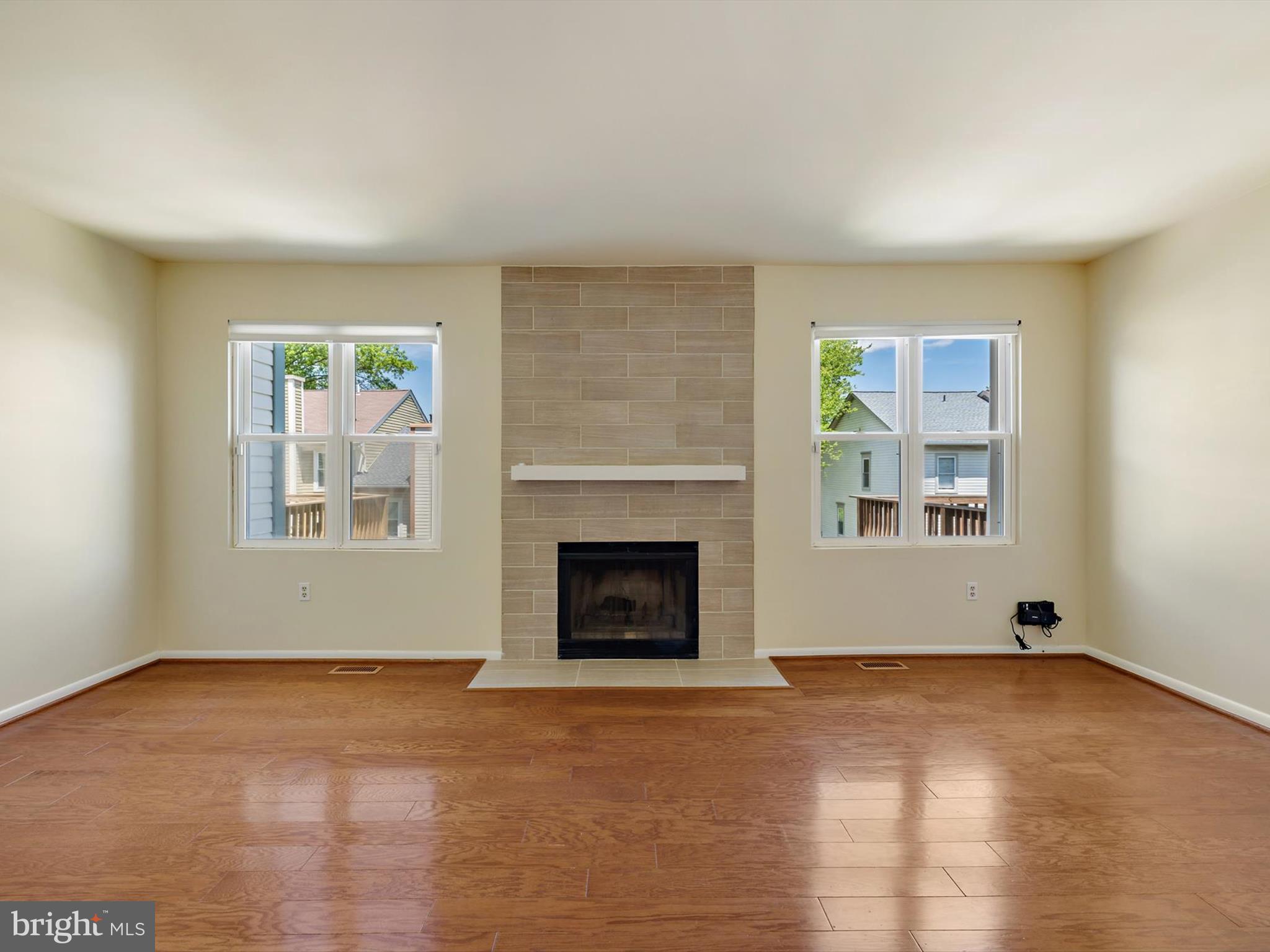 2846 Schoolhouse Circle Silver Spring, MD 20902 - Photo 9 of 32 a view of a livingroom with a fireplace and window