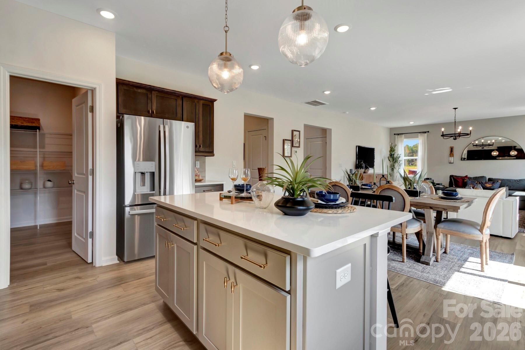 1458 Kate Cecil Way York, SC 29745 - Photo 19 of 40 a kitchen with a sink appliances and wooden floor