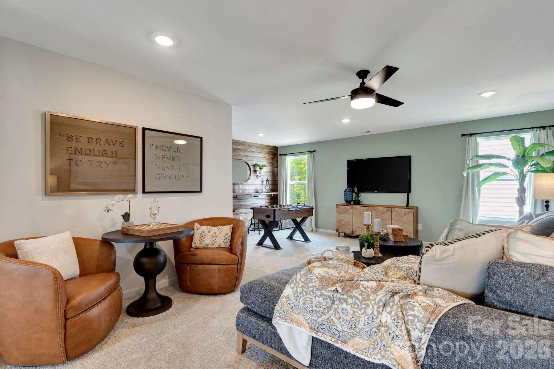 1458 Kate Cecil Way York, SC 29745 - Photo 21 of 40 a living room with furniture and a flat screen tv