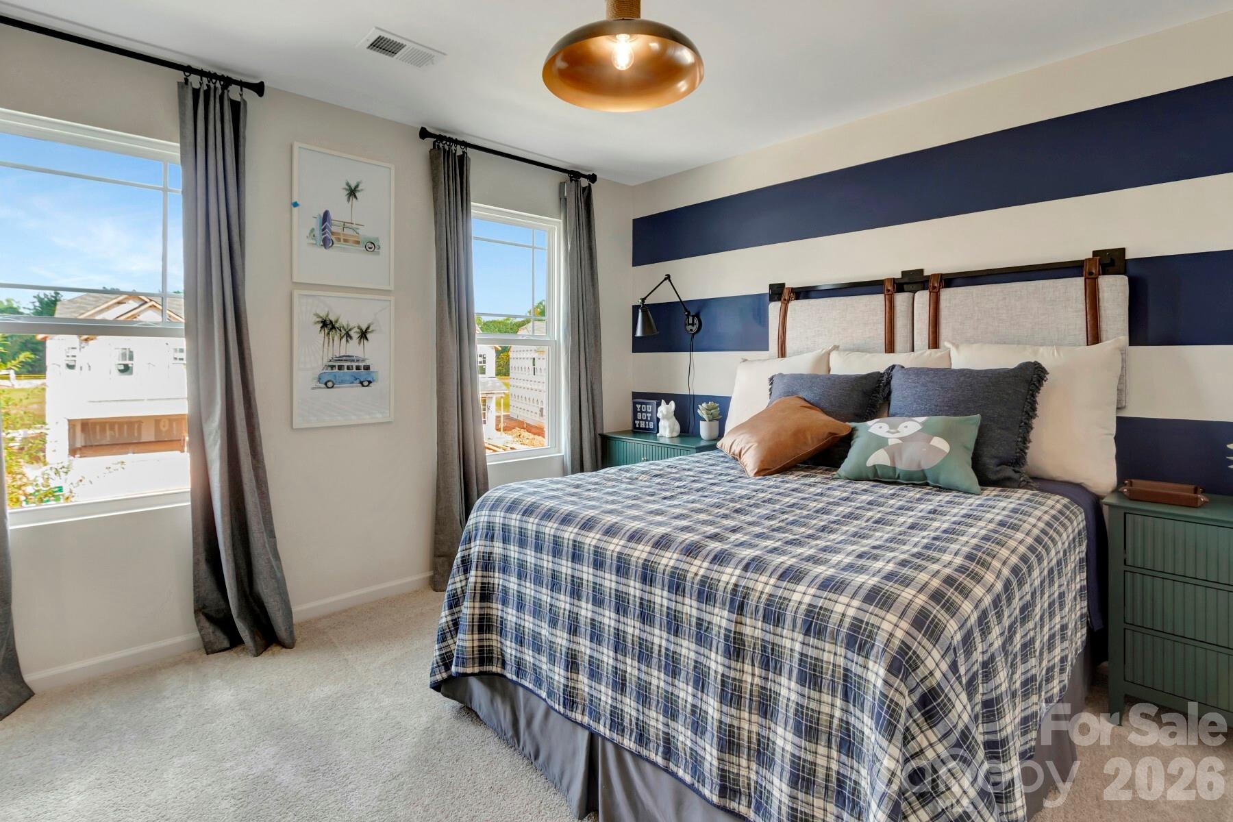 1458 Kate Cecil Way York, SC 29745 - Photo 26 of 40 a bedroom with a bed and closet