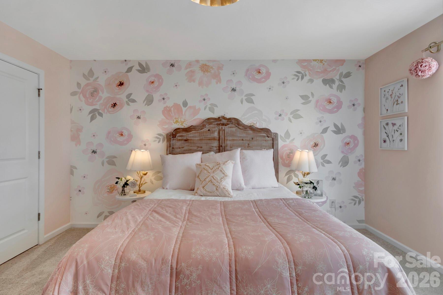 1458 Kate Cecil Way York, SC 29745 - Photo 29 of 40 a bedroom with a bed and a painting on the wall