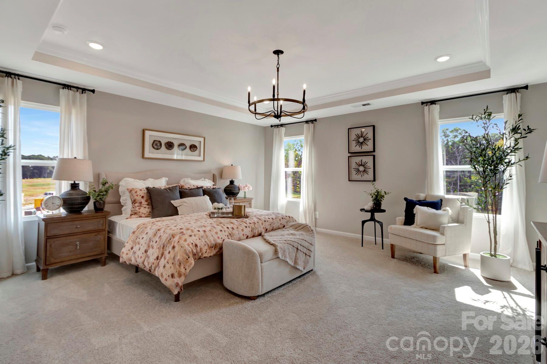 1458 Kate Cecil Way York, SC 29745 - Photo 35 of 40 a living room with furniture and a chandelier