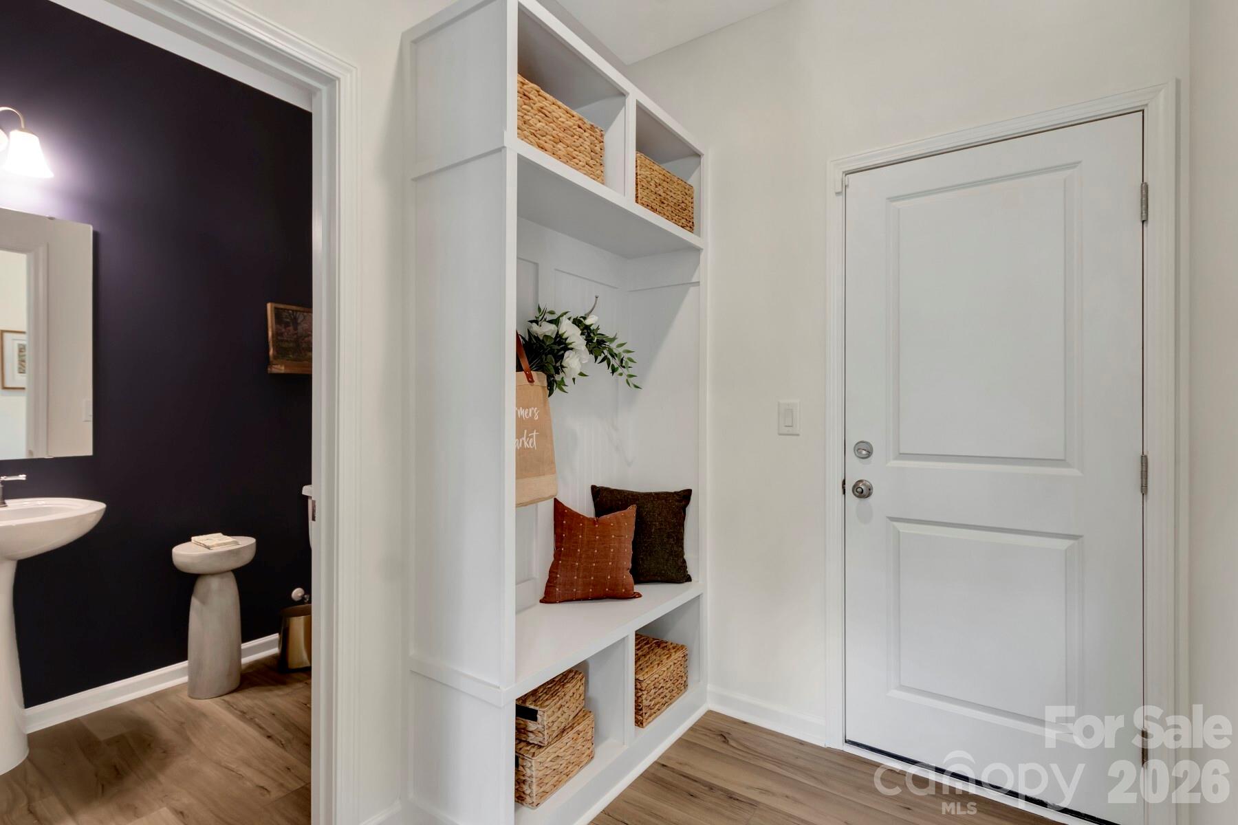 1458 Kate Cecil Way York, SC 29745 - Photo 8 of 40 a view of hallway with furniture and wooden floor