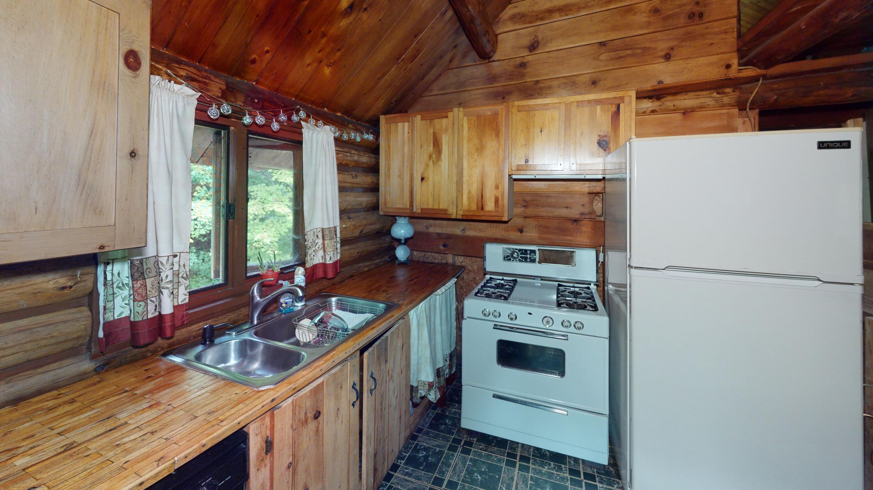 331 Long Falls Dam Road New Portland, ME 04961 - Photo 8 of 12 331-Long-Falls-Dam-Rd-Kitchen (1)