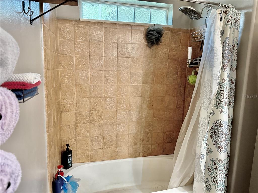 5321 South June Terrace, Unit 74 Homosassa, FL 34446 - Photo 20 of 28 a bathroom with a bathtub and shower