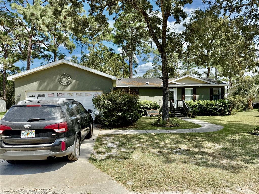 5321 South June Terrace, Unit 74 Homosassa, FL 34446 - Photo 3 of 28 a car parked in front of a house