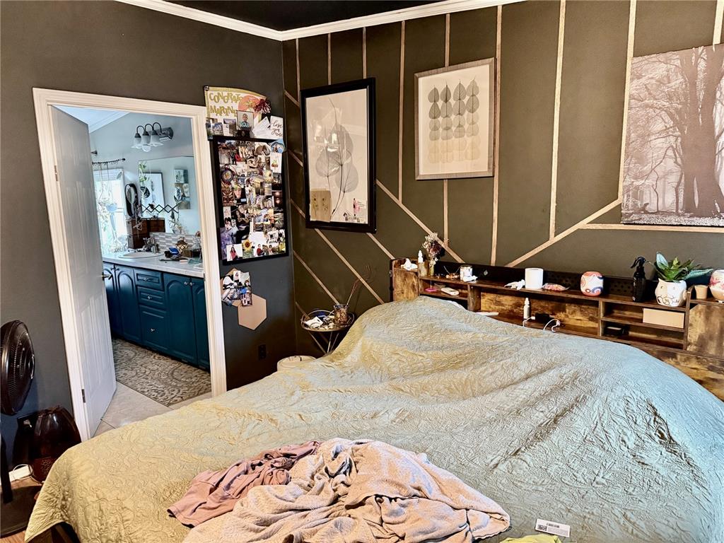 5321 South June Terrace, Unit 74 Homosassa, FL 34446 - Photo 5 of 28 a bedroom with a bed and a mirror