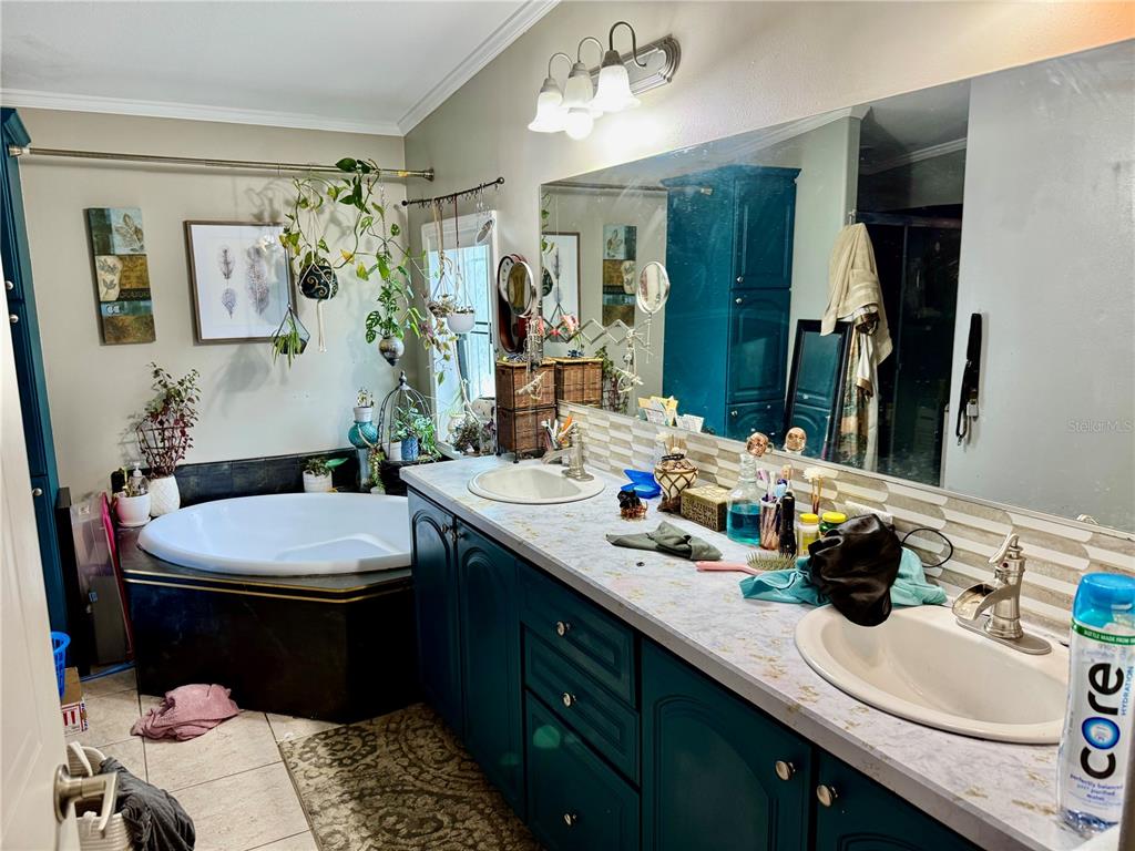 5321 South June Terrace, Unit 74 Homosassa, FL 34446 - Photo 6 of 28 a bathroom with a sink and a mirror