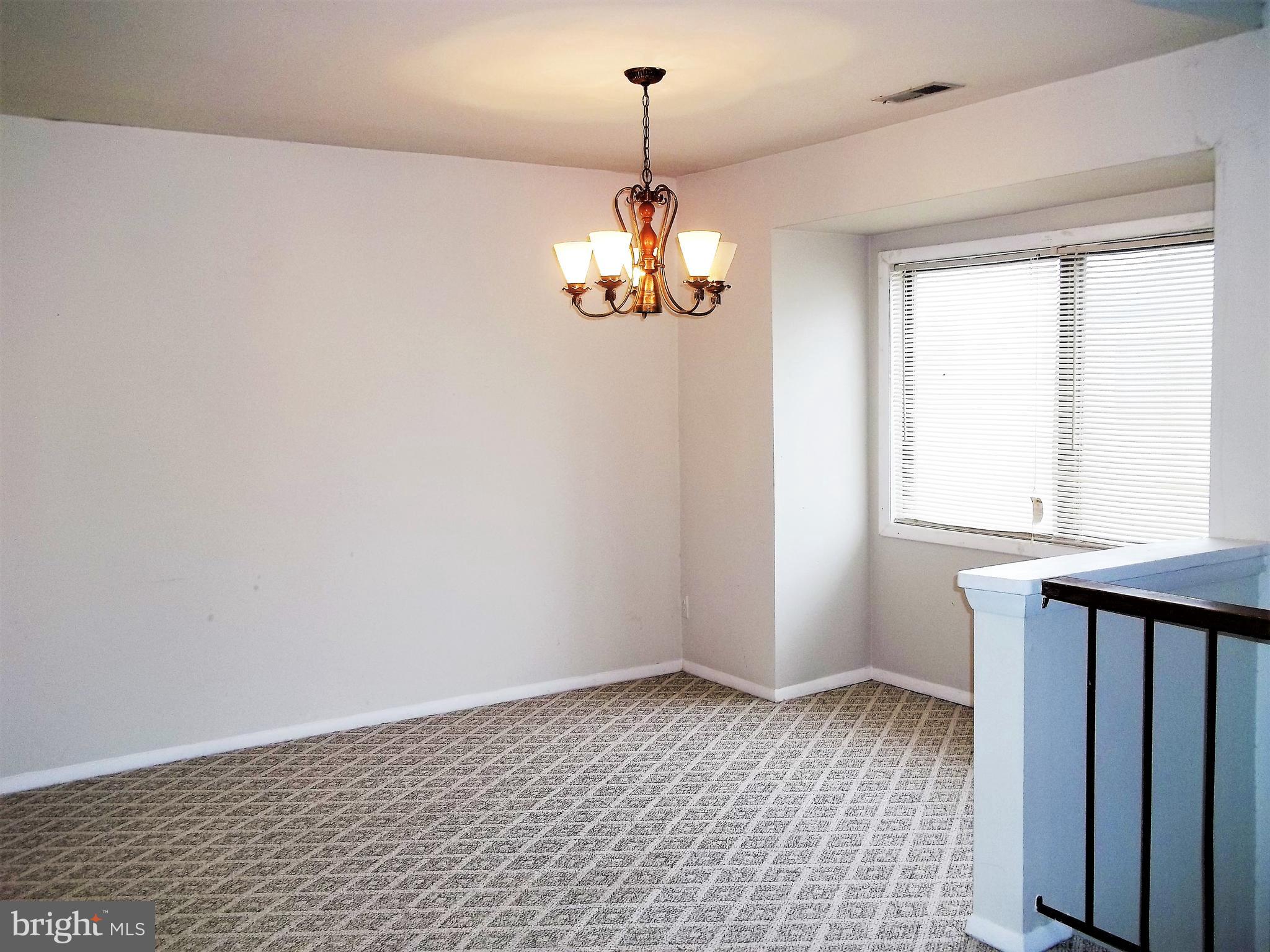 1726 Crimson Tree Way, Unit 18D Edgewood, MD 21040 - Photo 1 of 8 a view of a windows and chandelier in a room