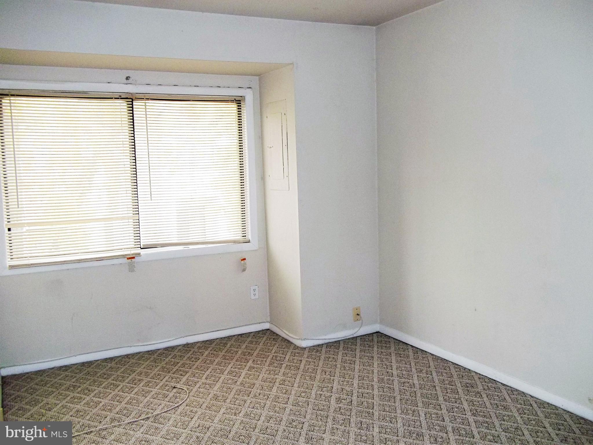 1726 Crimson Tree Way, Unit 18D Edgewood, MD 21040 - Photo 5 of 8 a view of an empty room with a window
