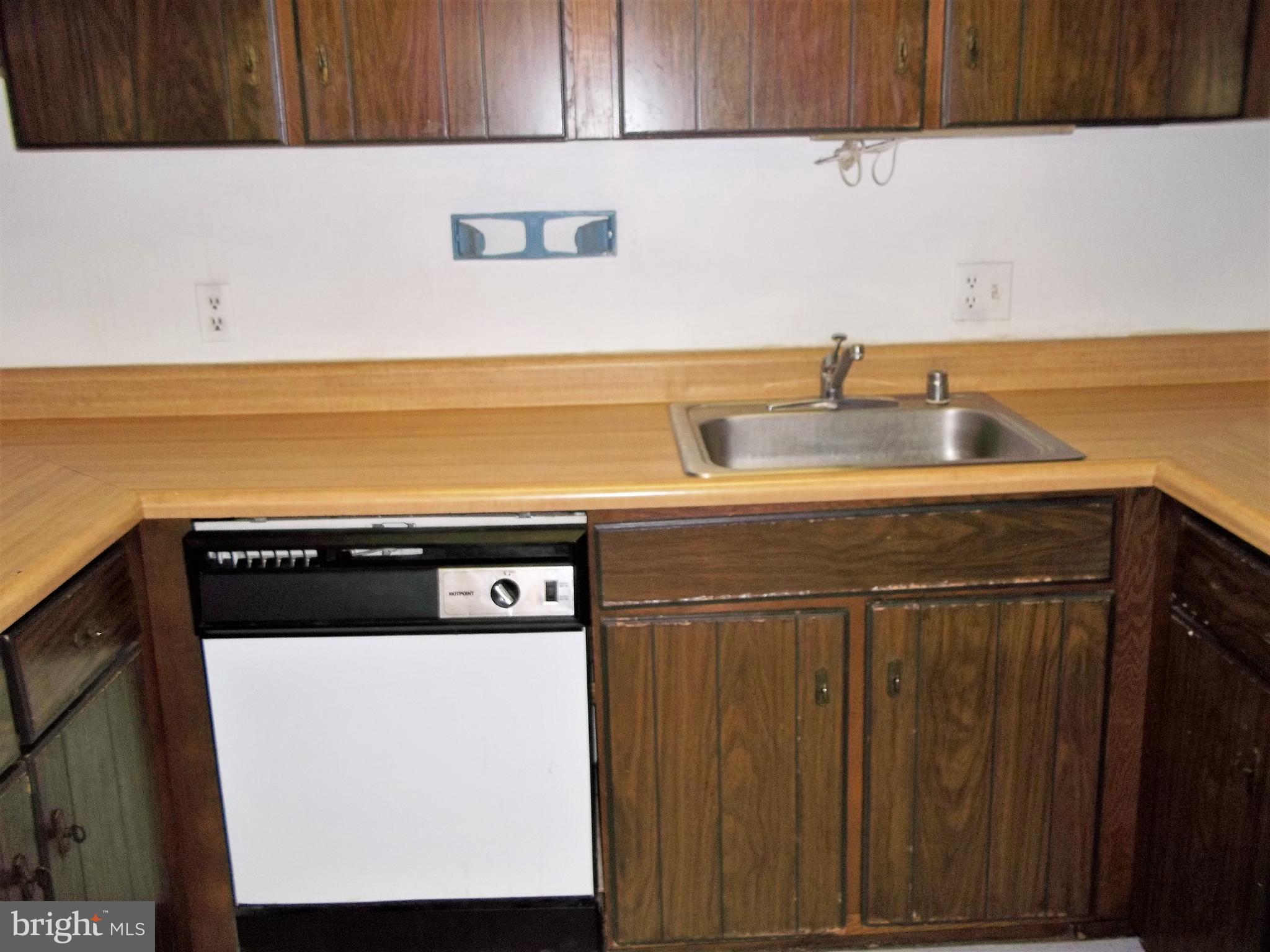 1726 Crimson Tree Way, Unit 18D Edgewood, MD 21040 - Photo 6 of 8 a kitchen with a sink and cabinets