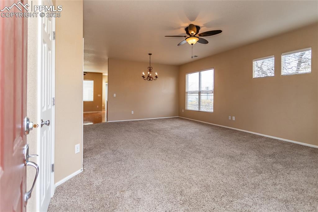 4829 Harrier Ridge Drive Colorado Springs, CO 80916 - Photo 3 of 50 a view of an empty room with a window