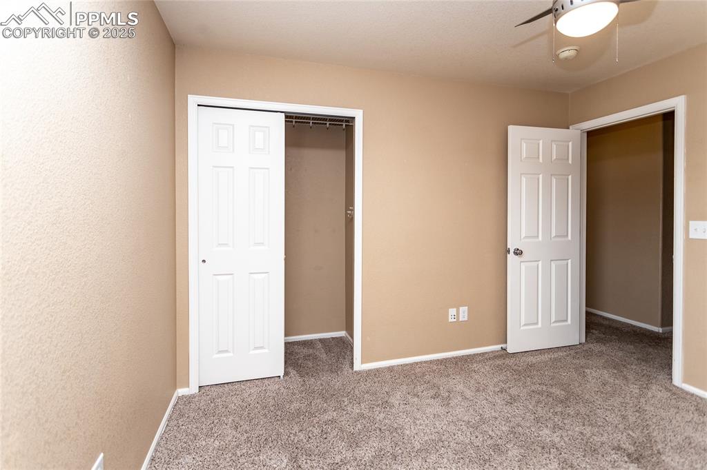 4829 Harrier Ridge Drive Colorado Springs, CO 80916 - Photo 37 of 50 an empty room with closet area