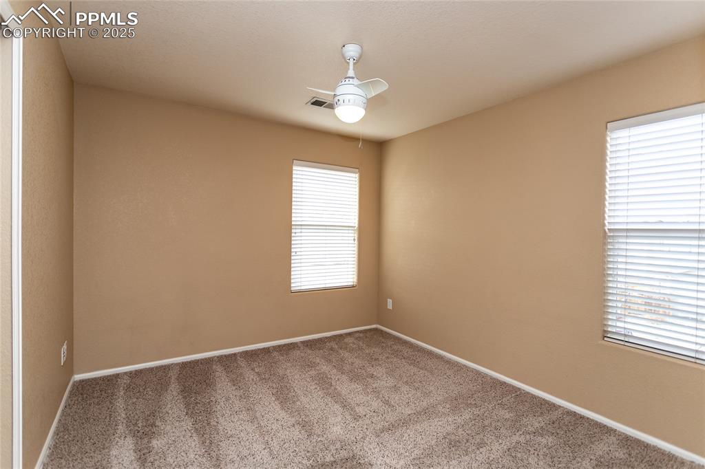 4829 Harrier Ridge Drive Colorado Springs, CO 80916 - Photo 38 of 50 a view of an empty room with a window