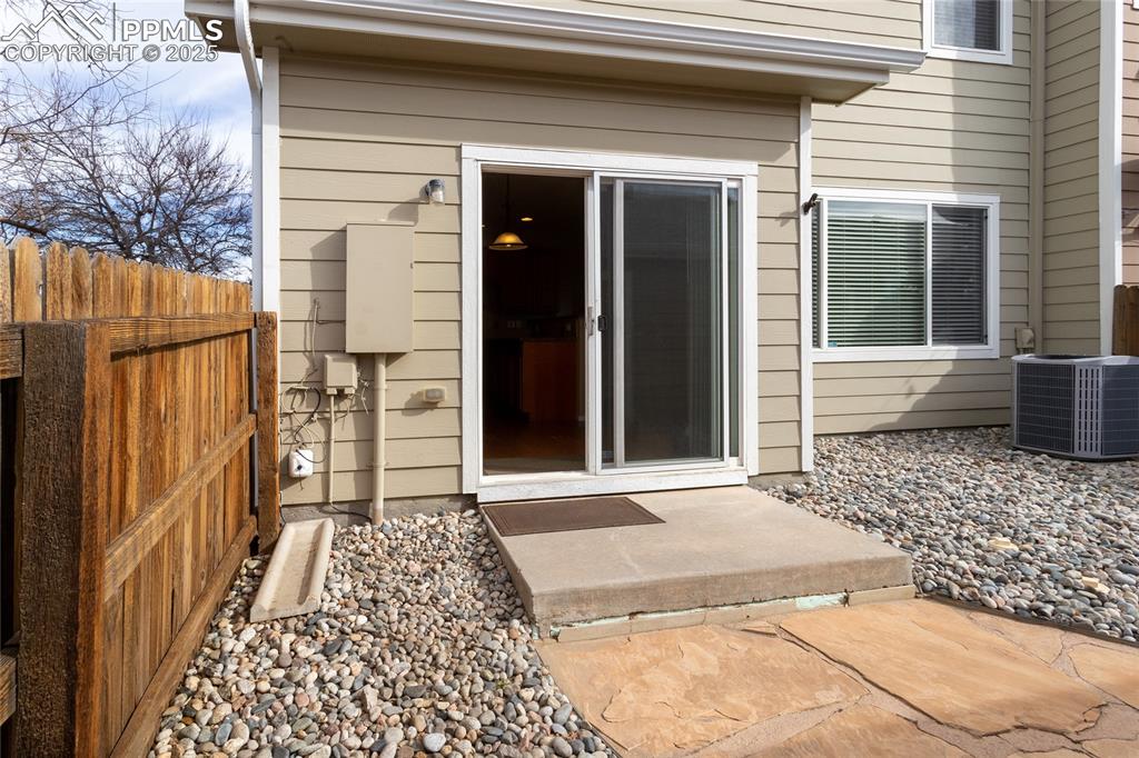 4829 Harrier Ridge Drive Colorado Springs, CO 80916 - Photo 42 of 50 a view of a entrance door of the house