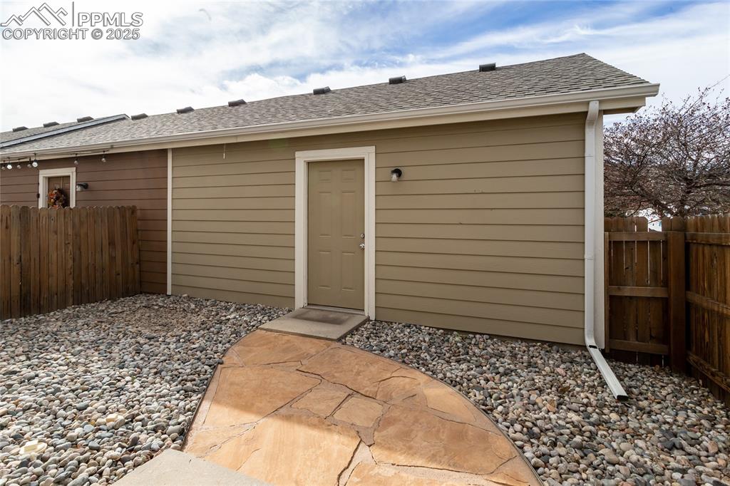 4829 Harrier Ridge Drive Colorado Springs, CO 80916 - Photo 44 of 50 a view of a house with a backyard