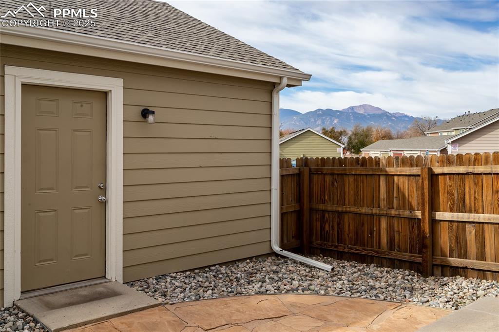 4829 Harrier Ridge Drive Colorado Springs, CO 80916 - Photo 47 of 50 a view of a house with a wooden fence