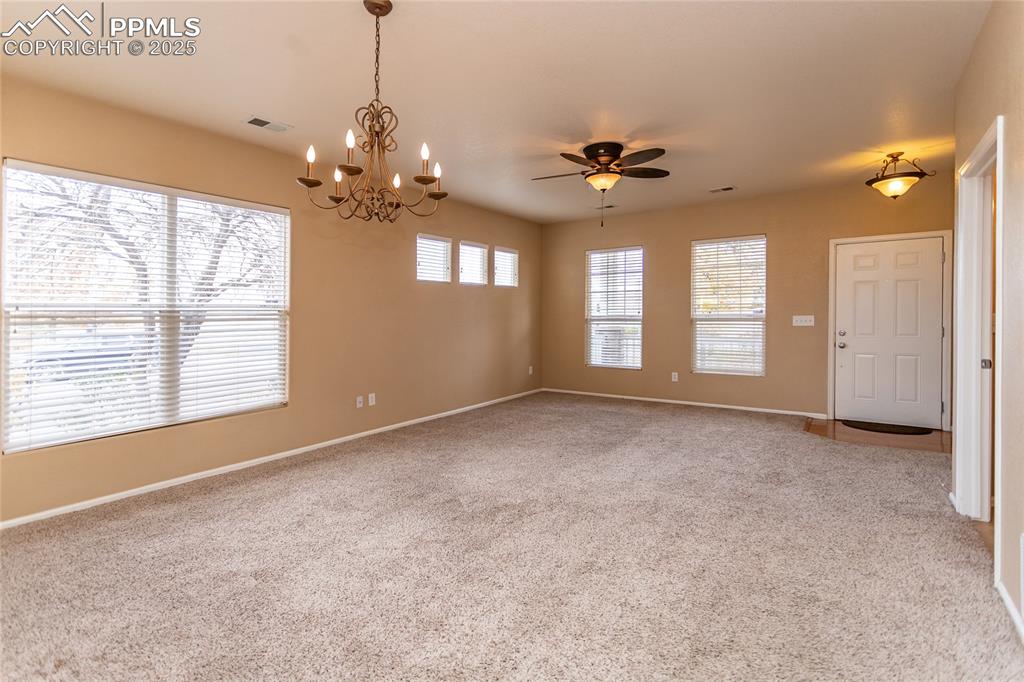 4829 Harrier Ridge Drive Colorado Springs, CO 80916 - Photo 9 of 50 a view of an empty room with a window